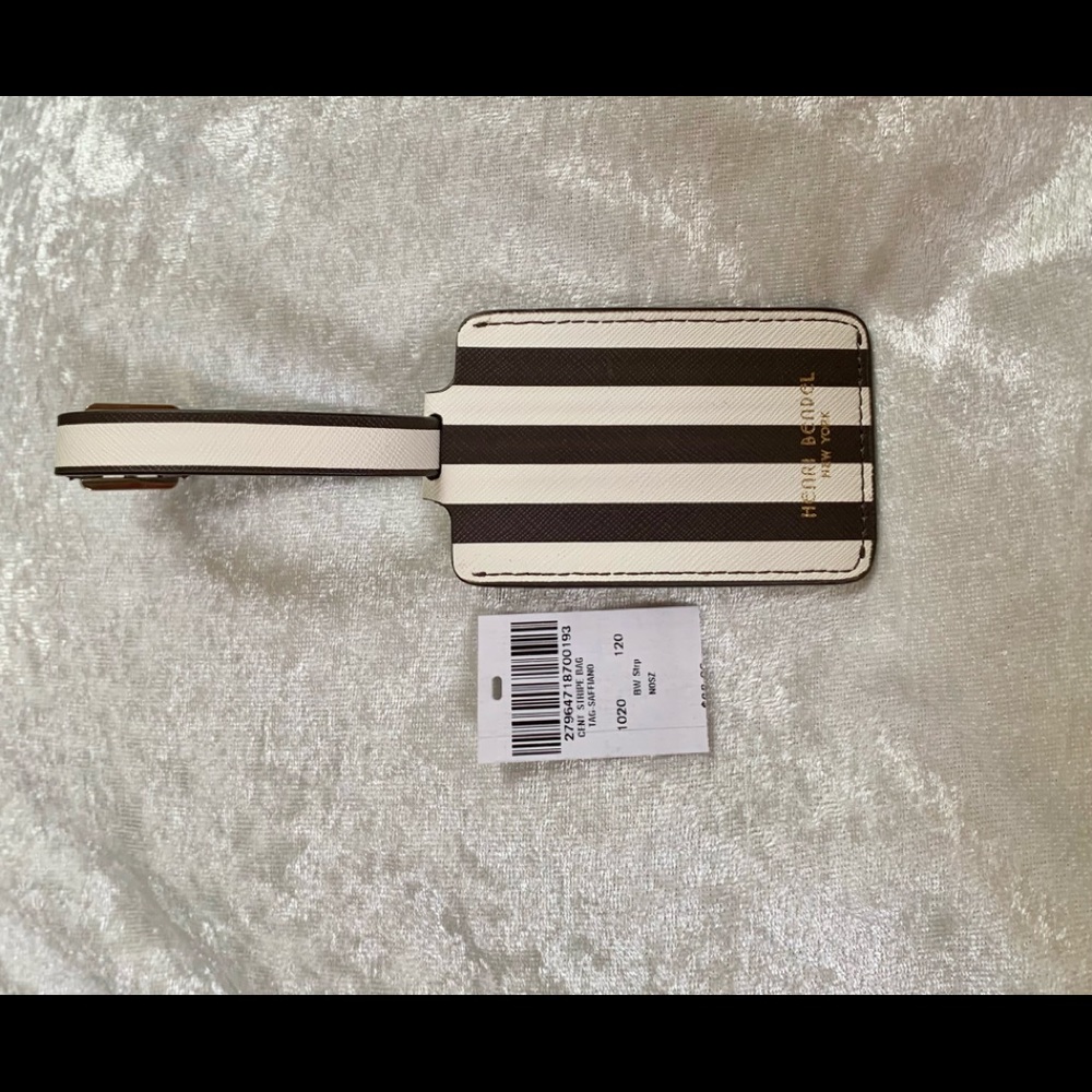 Henri Bendel Brown and White Travel Bag Tag